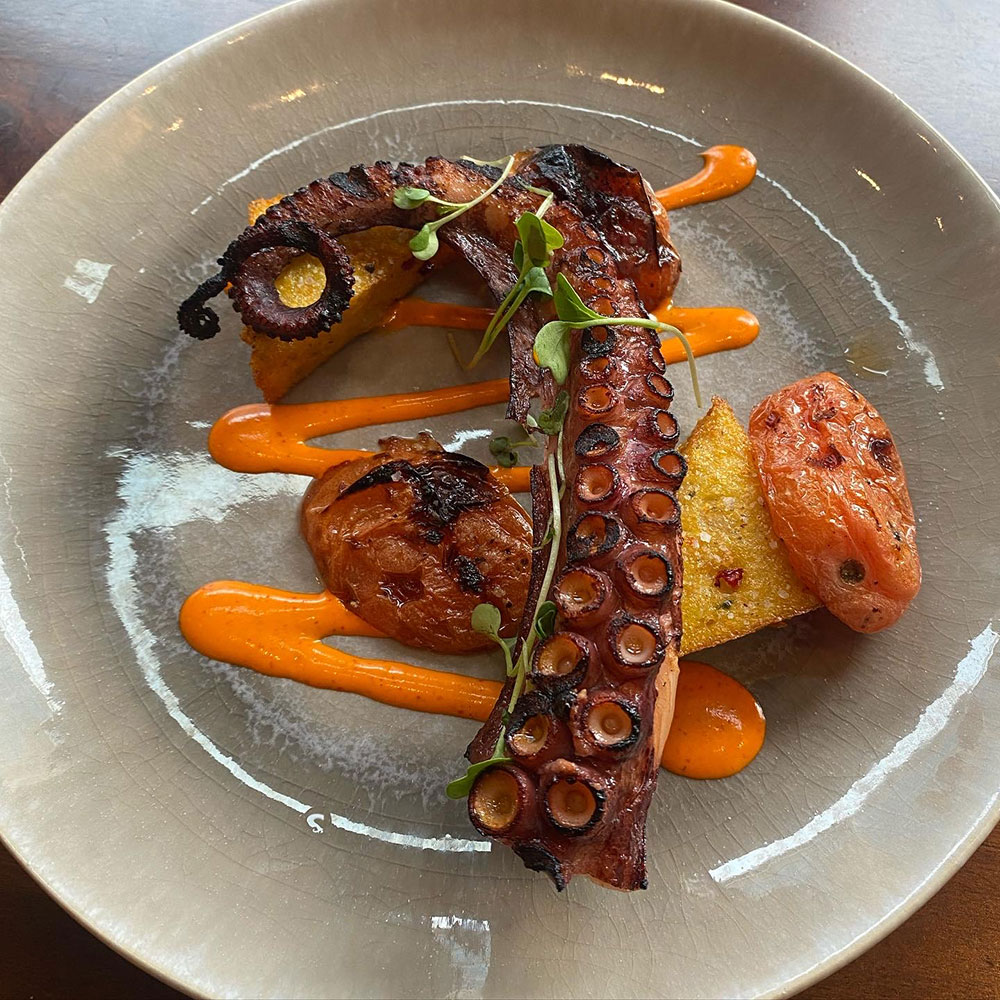 JOSPER GRILLED OCTOPUS Crispy Polenta, Blistered Tomatoes, Calabrian Vinaigrette